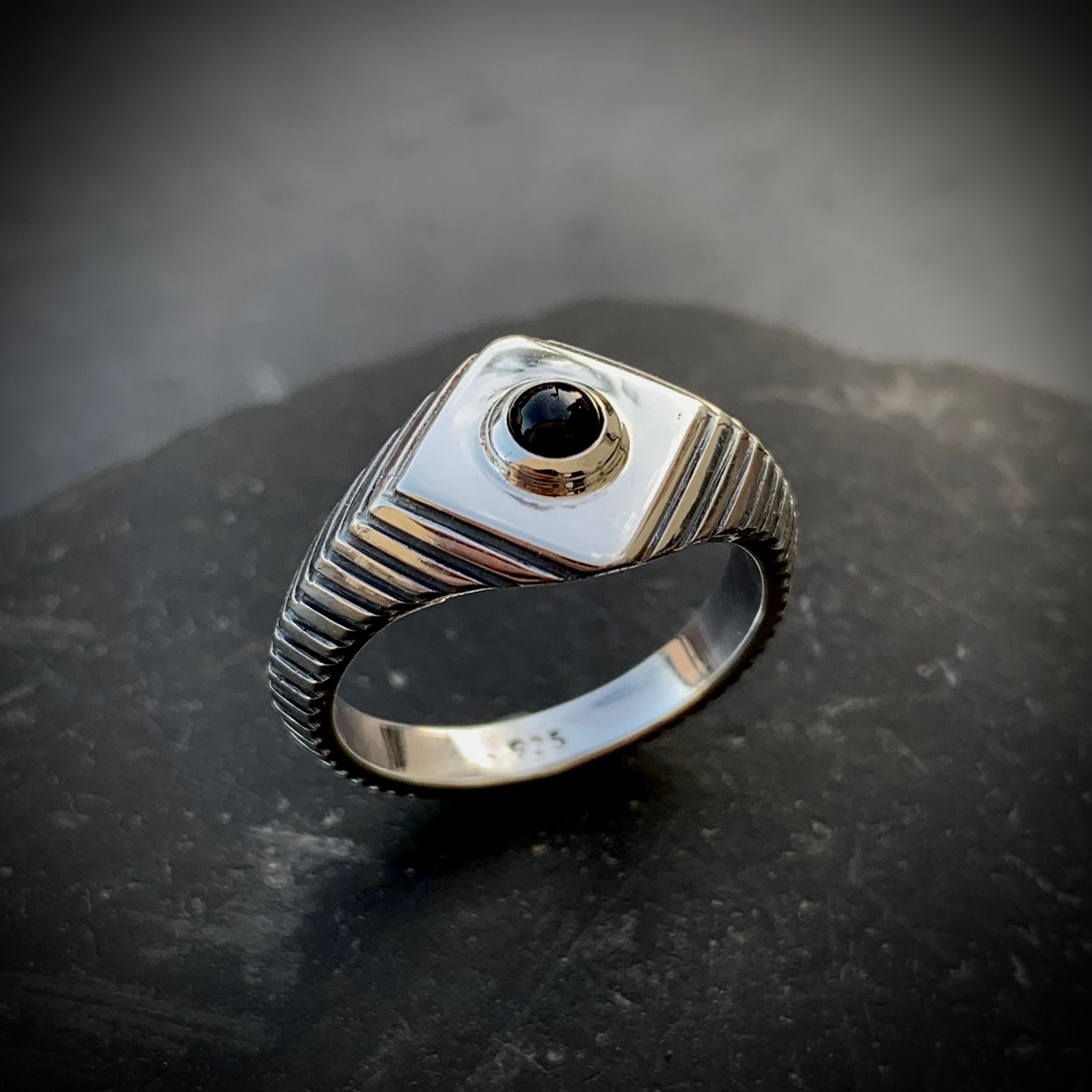 Titanium on sale onyx ring